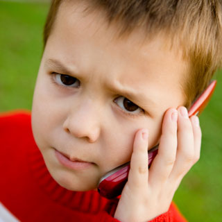 boy talking on phone